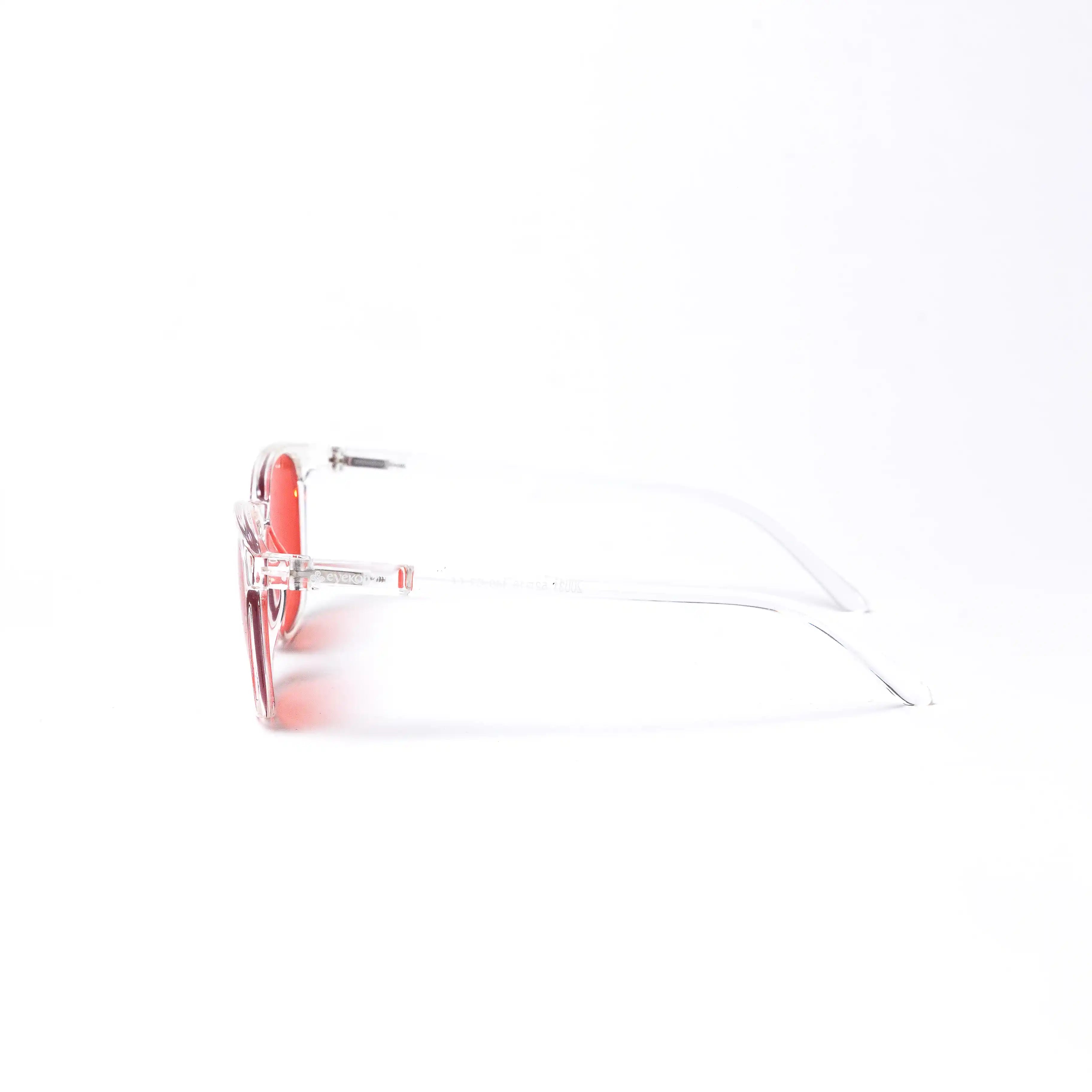 Ek73: Transparent Frame – Red Lens