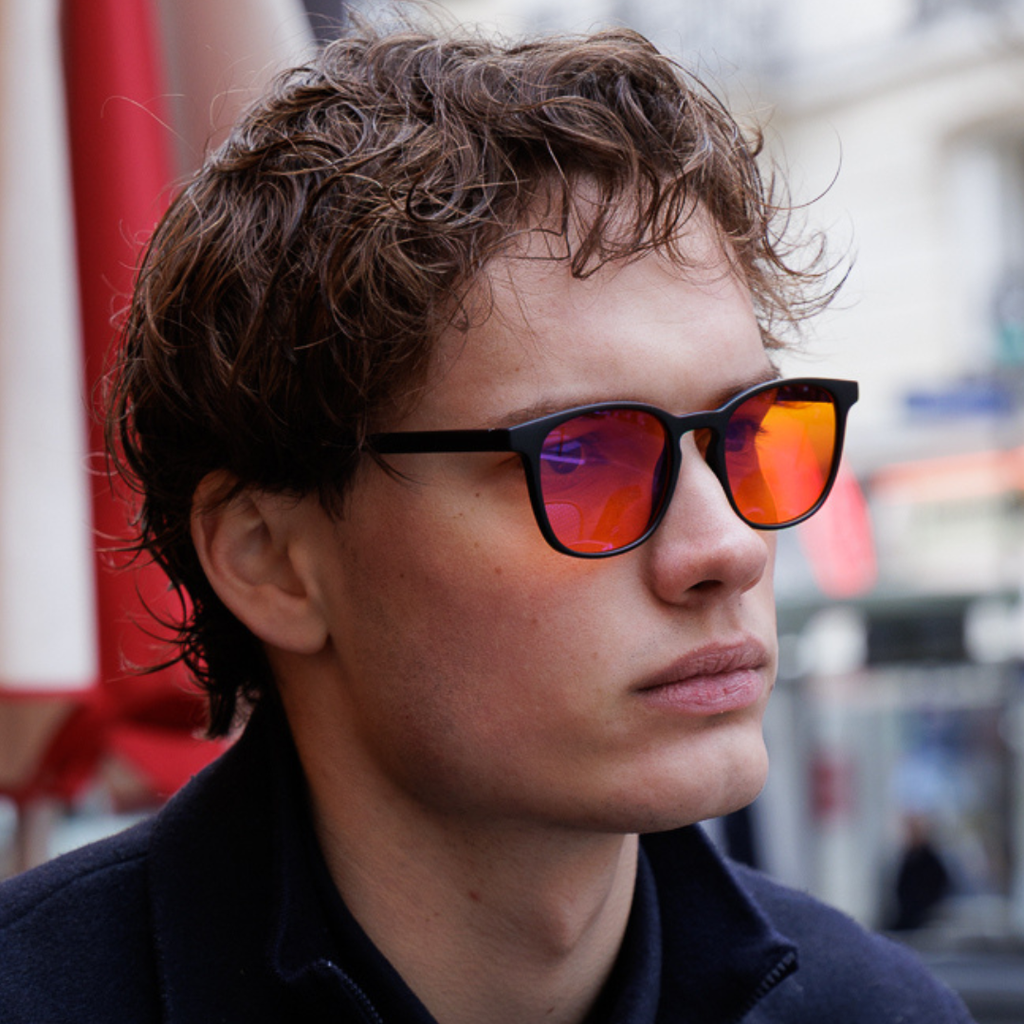 Ek1:  Black Frame – Orange Lens