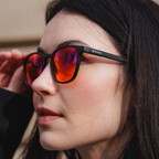 Ek1:  Black Frame – Orange Lens